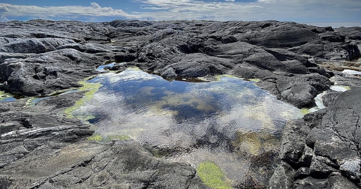 Sky reflected in water 
