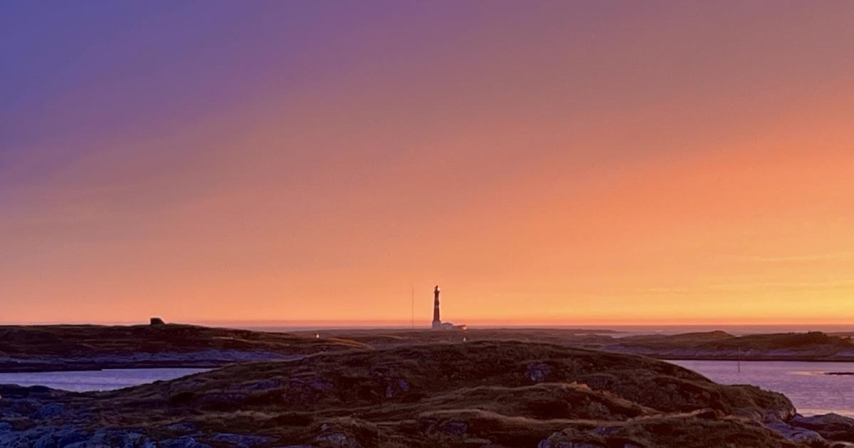 Lighthouse in sunset with vivid colors